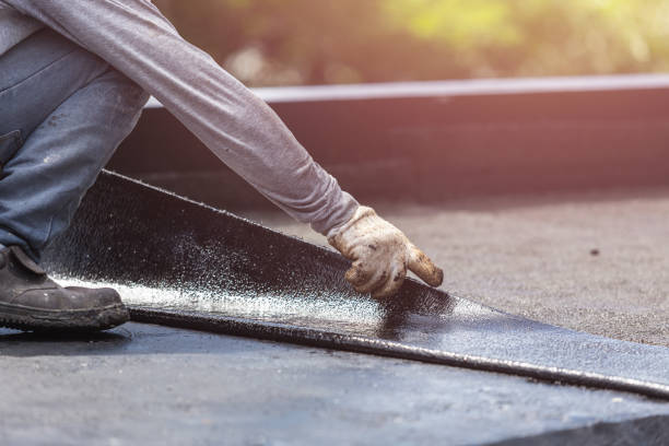 Professional Basement Waterproofing technician working in Barnesville, GA